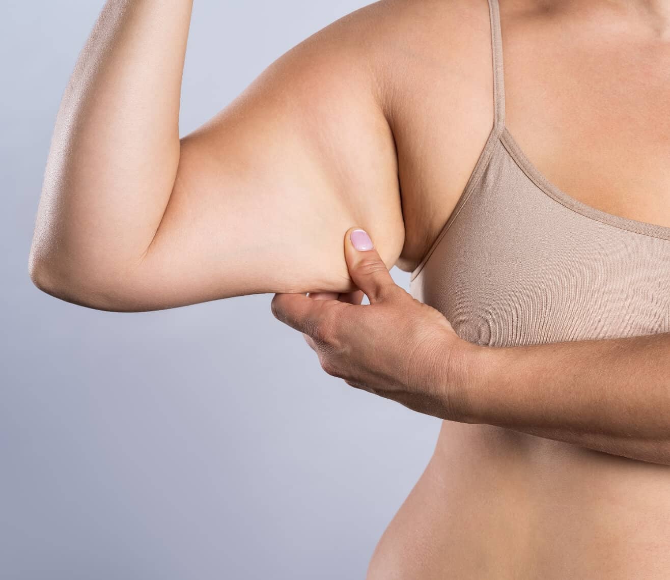 What causes flabby arms